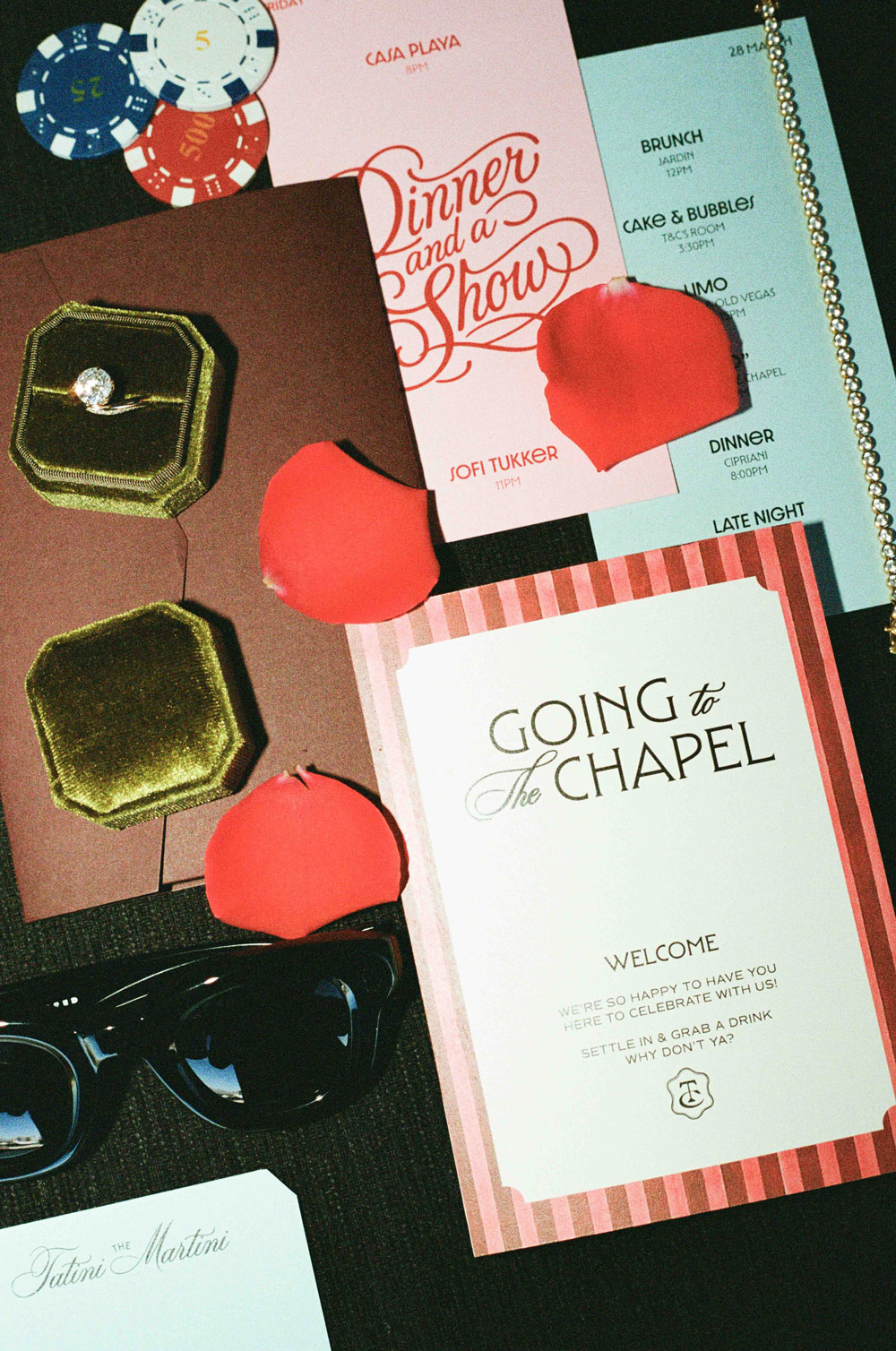 Wedding stationery in Las Vegas with red petals.